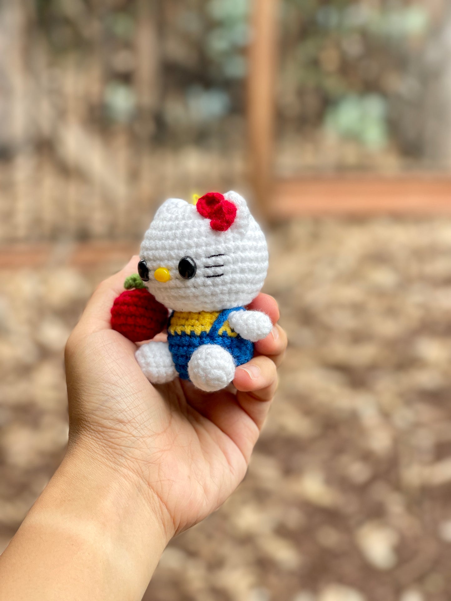 Hello Kitty Holds An Apple Crochet Keychain