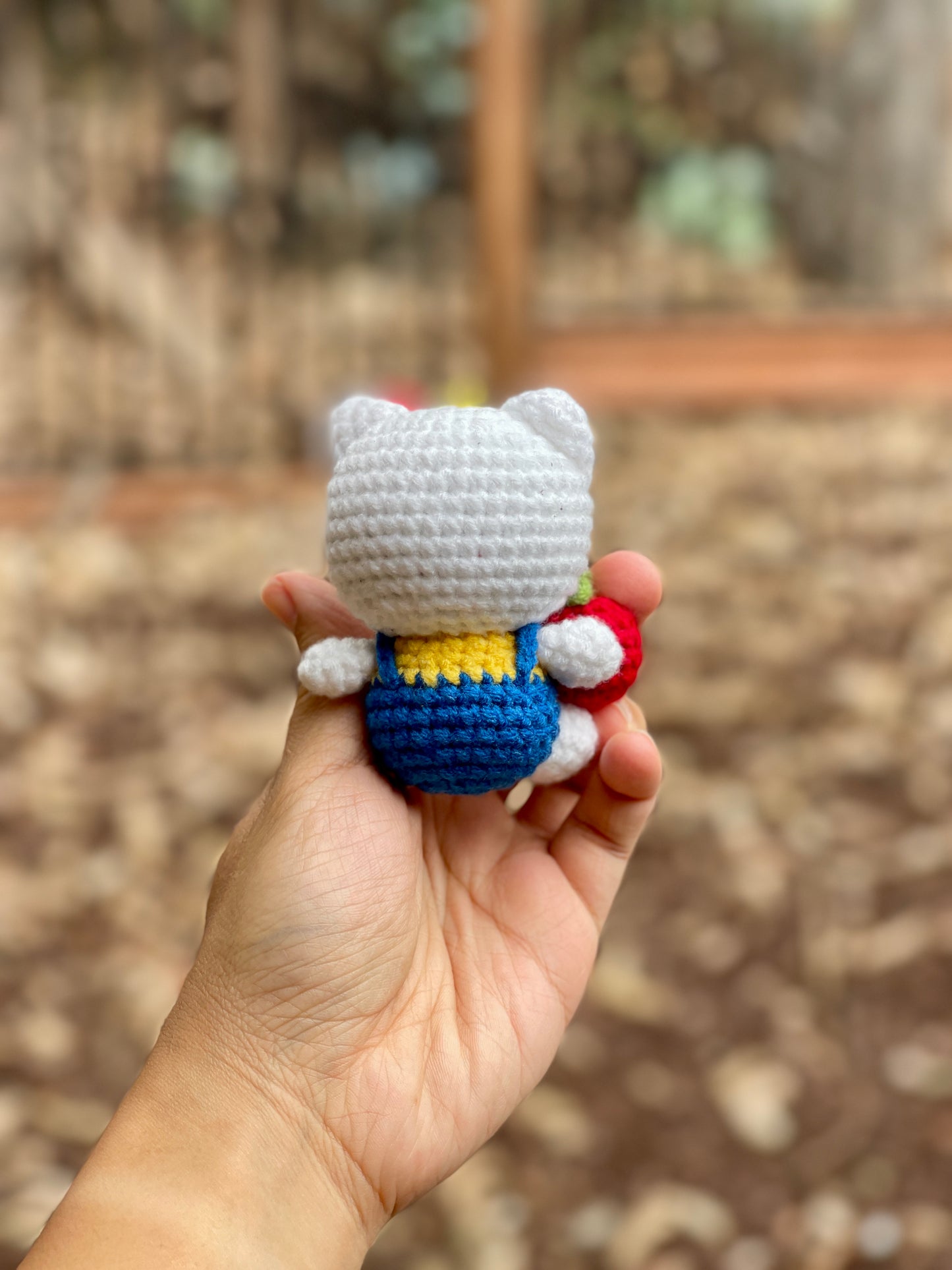 Hello Kitty Holds An Apple Crochet Keychain
